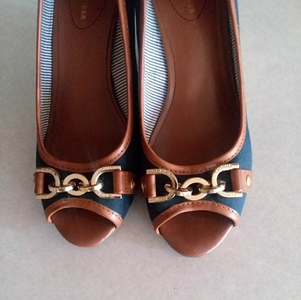 Ladies slip on shoes with wedge heel.